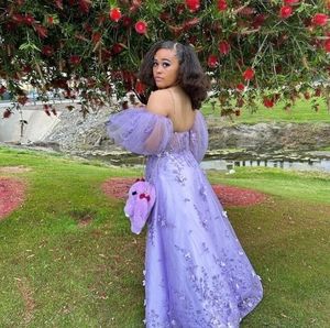 Lavender corseted sparkly dress with thigh slit.